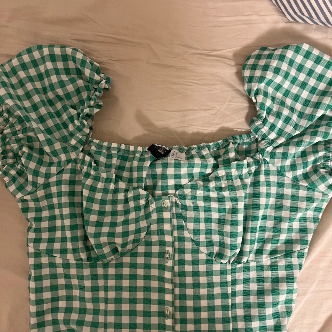 Grönrutig klänning