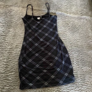 Klänning  - En rutig jätte kön klänning 