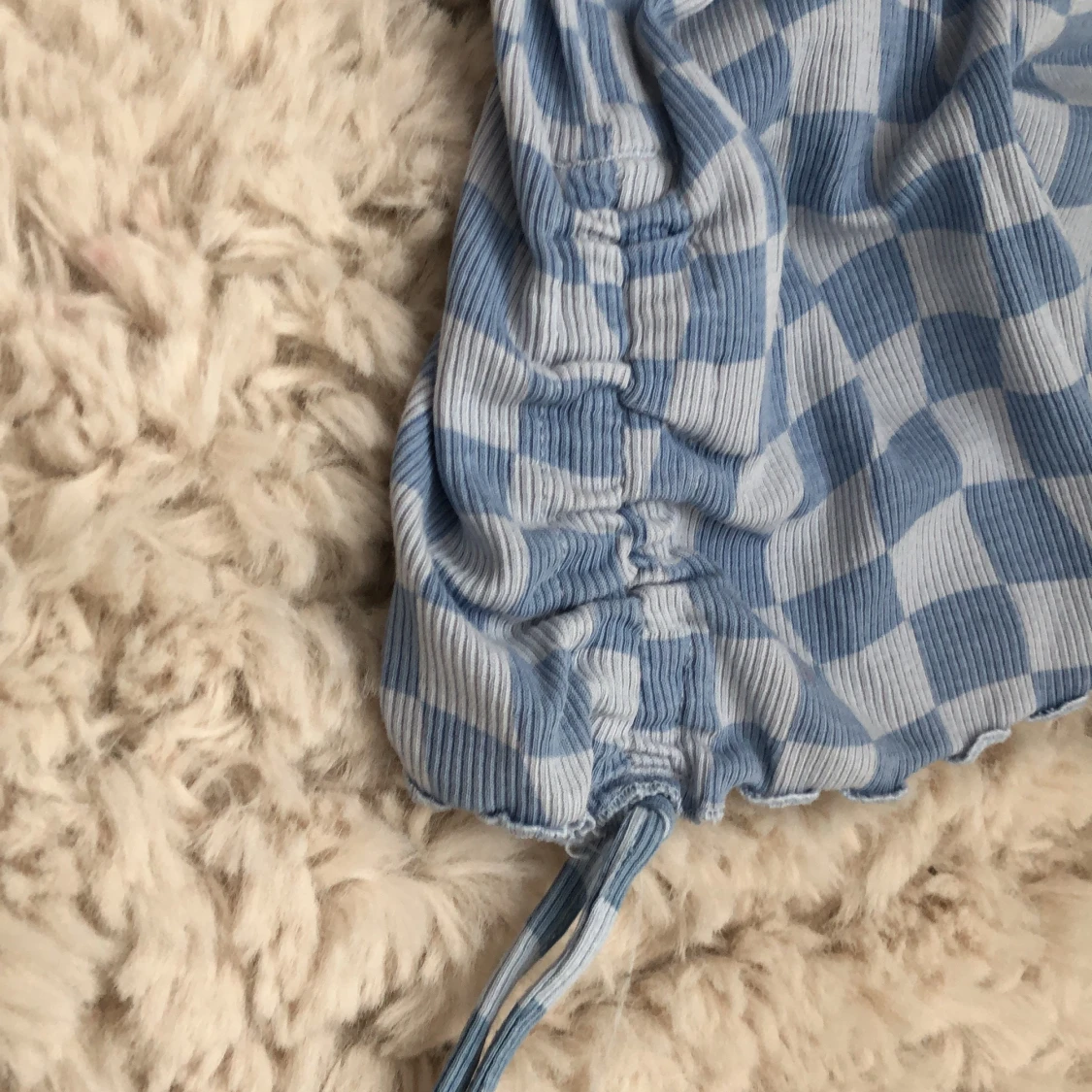Blå rutig tröja - 91