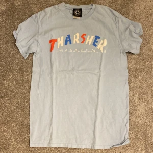 Thrasher (Tharsher) Tshirt - Brand New Thrasher Tshirt. Note the spelling is on purpose. Size S, Small. Message for more images.