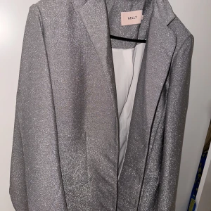 Glitter kavaj, blazer - Jätte snygg glitter kavaj, men kommer aldrig till användning.