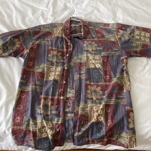 Flower Shirt - Thin button up in perfect condition. Good for summer and less than 6 months old. Worn very few times.