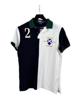 Multifärgad piké  - Piké från Polo Ralph Lauren.  Plagget har en normal passform.  Mått, i cm:  Bröst: 104 Rygg: 77 Midja: 100 Stuss: 102