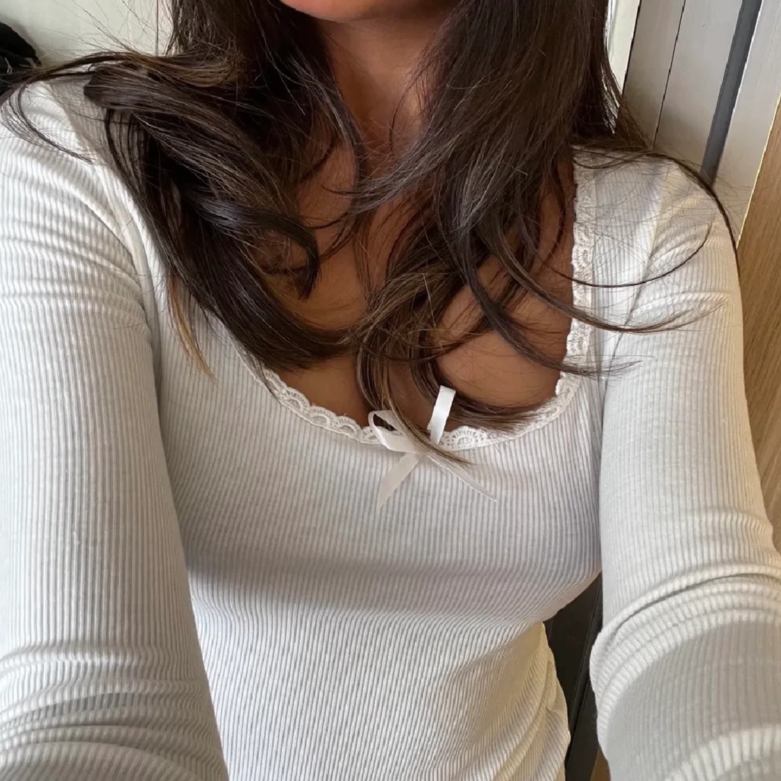 Långärmad spets topp