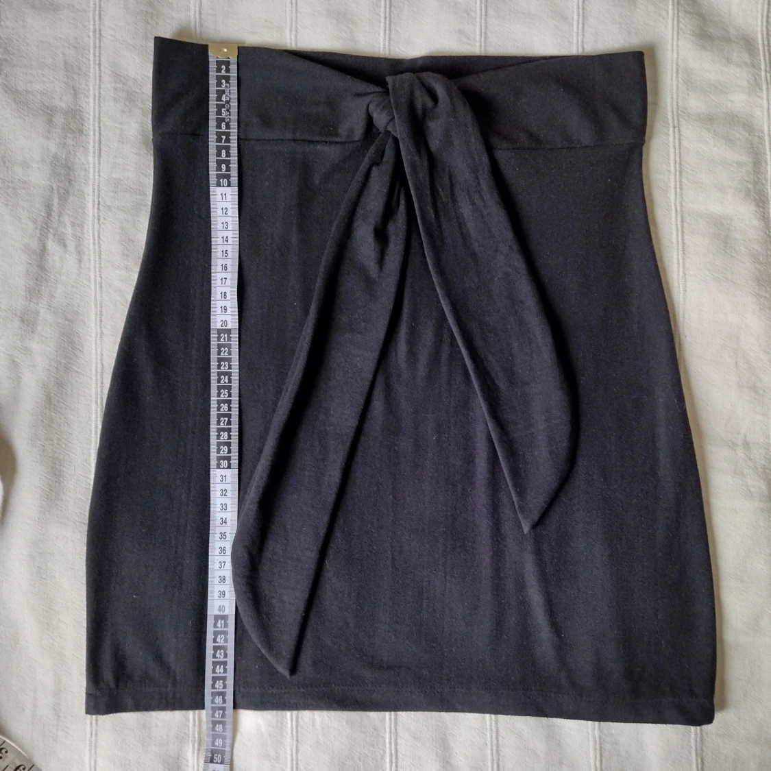 Svart kort kjol med knytband, storlek XS/S - 90