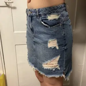 Lågmidjad cool jeans kjol