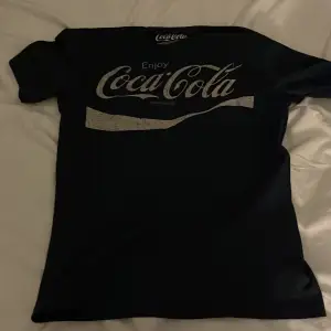 Vintage Coca-Cola T-shirt i storlek S