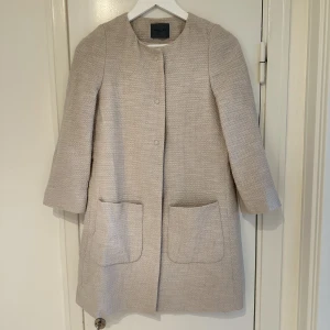 Kappa - Ljusrosa vårkappa 