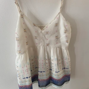 Sommarlinne - Somrigt linne med justerbara band 