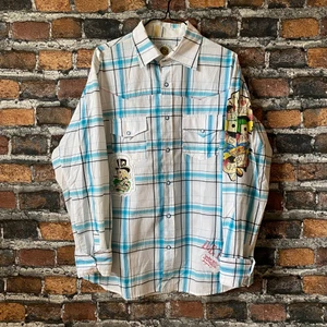 Vintage Ed Hardy skjorta - Unik vintage äkta Ed Hardy skjorta i storlek L. Condition: 8/10. För fler bilder eller mått kontakta mig 👏 Frakt sker via PostNord spårbart 57 kr 