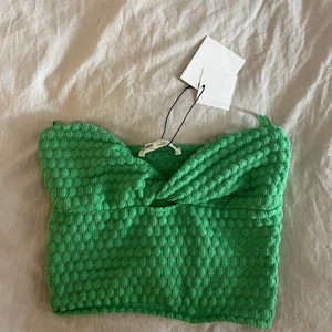 Topp  - Helt ny med alla lappar på, endast testad