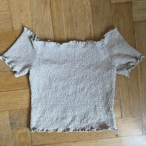 Topp  - Beige topp i stretch