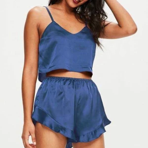 Sidenpyjamas xs - Väldigt fin sidenpyjamas från missguided i strl xs. Aldrig använd, 150kr