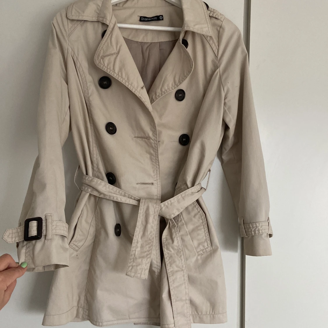 Beige trenchcoat