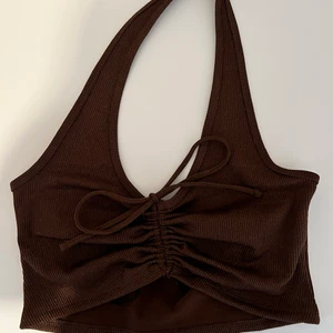 Brun topp H&M - En brun topp i storlek M köpt på H&M för 90kr. Säljer då den är för liten för mig