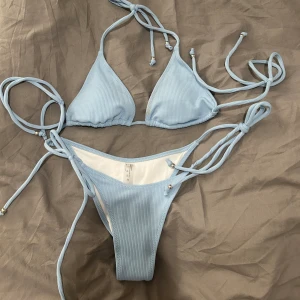 Bikini  - Ljusblå bikini. Strl m🩵