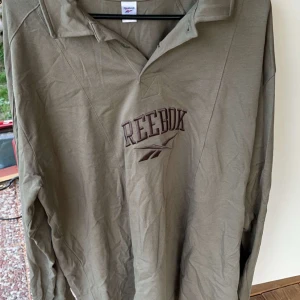 Reebook pike - En mörkgrön piké från reebook!