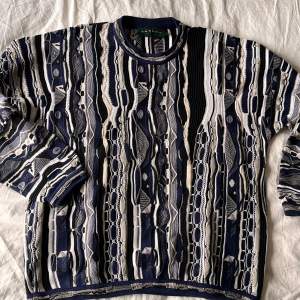 Snygg oversized vintage stickad tröja ger en Carlo calucci vibe 