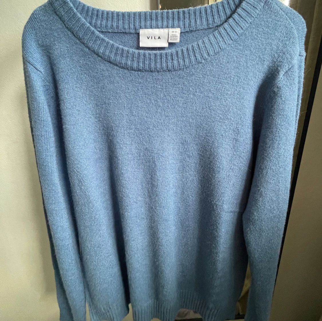 Blå stickad tröja