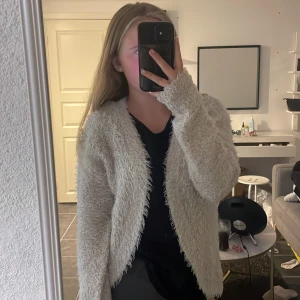 Kofta - En kofta med paljetter 