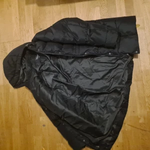 Hyggestraket6  1101 - Oanvänd snöjacka för dam, svart, storlek 2X-large, lång