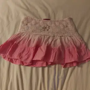 Mini skirt from Kappahl. Pink. Short. Zipper on the side. Very small hole under zipper.