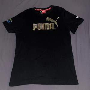 Puma t-shirt (herr) i storlek S.