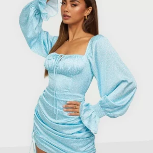 Adoore klänning  - Capri dress blå från adoore fint skick går att justera kort eller lång