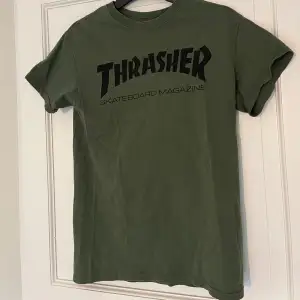 Grön Thrasher T-shirt i storlek S, i gott skick.