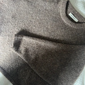 Stickad tröja  -  Har ballong armar