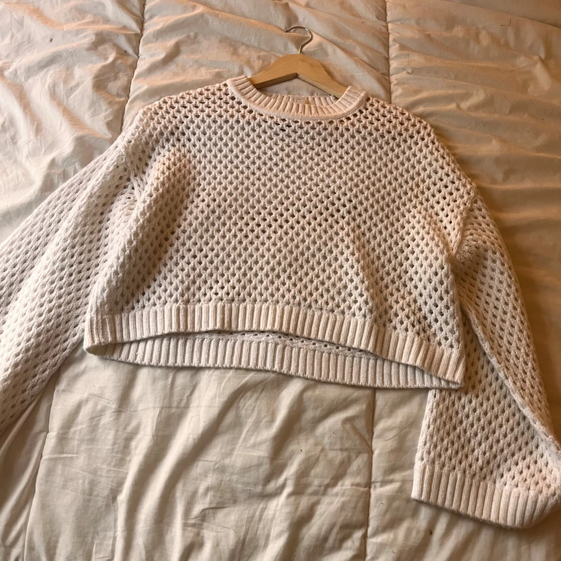 Vit stickad tröja