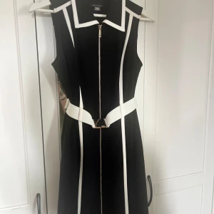 Klänning Tommy Hilfiger - Använd en gång. I nyskick!  Storlek 2  Motsvarar xs/s  32/24