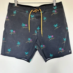 Billabong swim shorts  - Swim shorts, never used. Back pocket with velcro as shown in the picture. 
