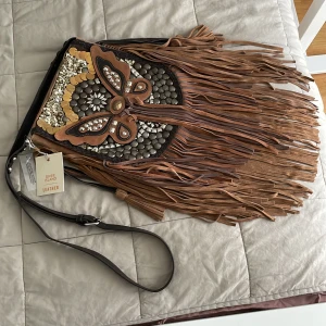 Leather bohemian crossbody bag  - Brand River island  Never used  Leather 