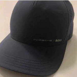 Hugo boss  - Nytt  Knappt använd  Hugo boss  Porsche  Storlek small medium 