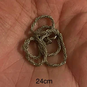 Fotlänk armband silver - Inte säker på material.