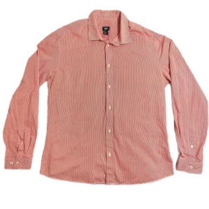 Rosa skjorta från H&M - Skjorta från H&M i nyskick. Finrandig i vitt och rosa.