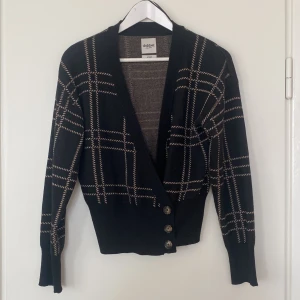 Cardigan - Cardigan som markerar midjan