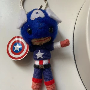 Nyckelring  - Captain America nyckelring, oanvänd  Frakt 16kr postas i kuvert 