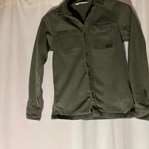  Skjorta/overshirt - H&M skjorta/overshirt  Strl 158 Skick 8/10 