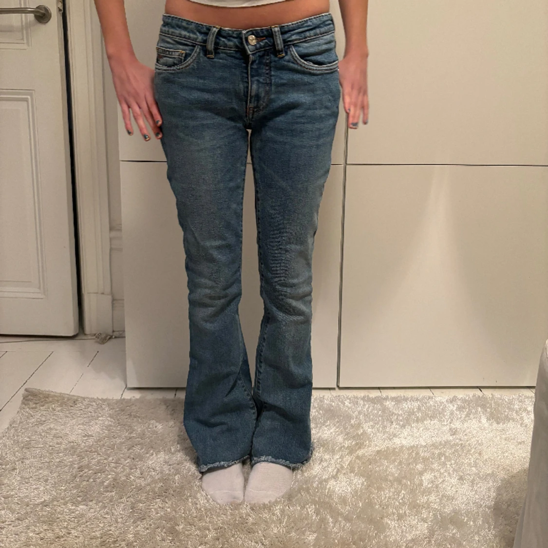 Blå bootcut jeans