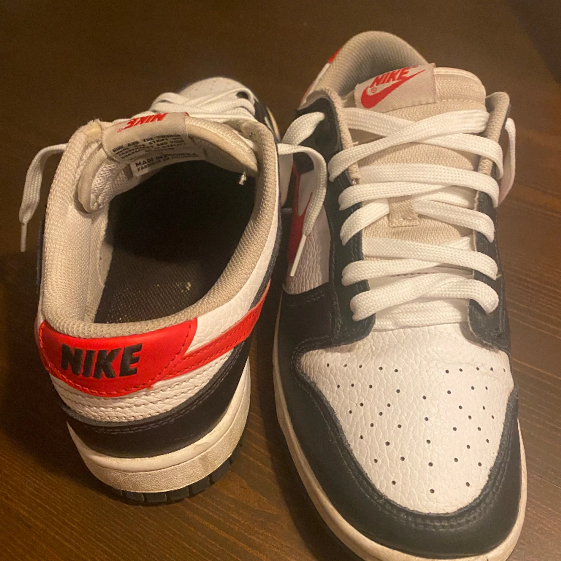 Dunk low red swoosh - 91