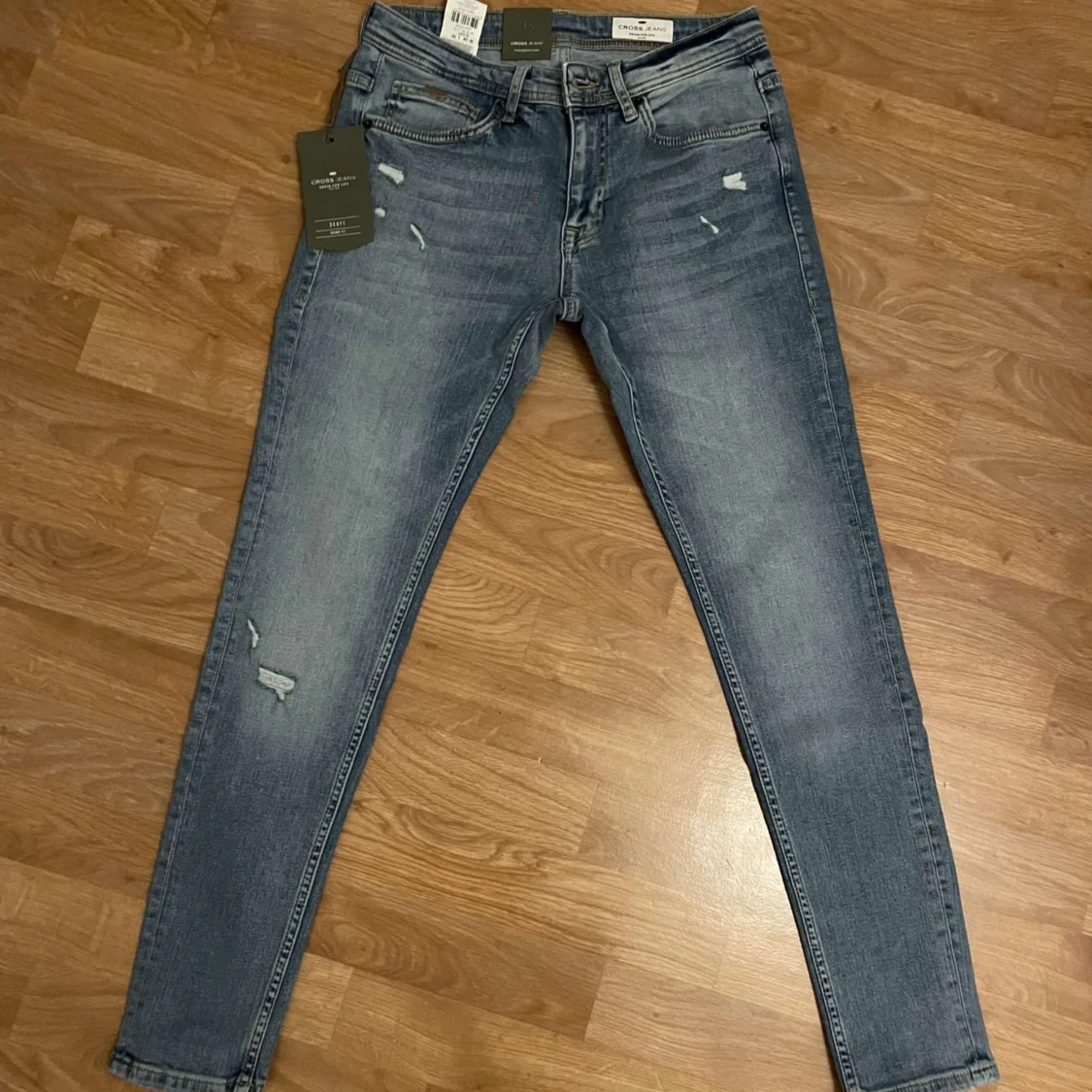 Cross Skin Fit Jeans