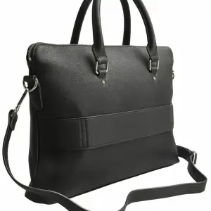 En handväska som också kan användas som datorväska i fint skick.  Det är en Don Donna väska som är sparsamt använd. 