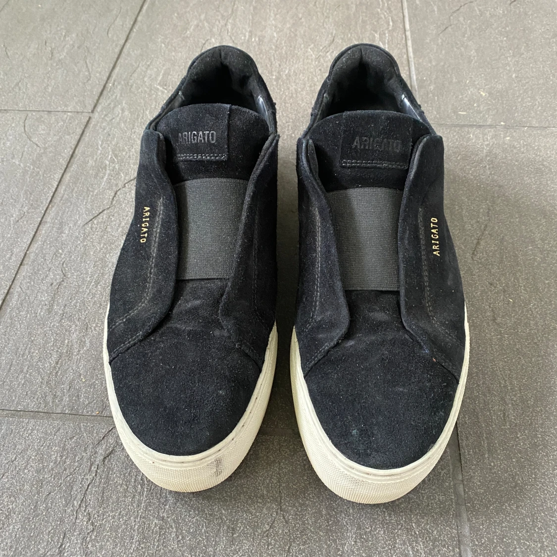 Axel Arigato skor