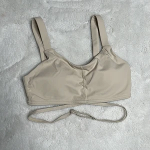 Sport bh - Beige sport bh med band runt magen  Oanvänd Strl: S Saknar logga