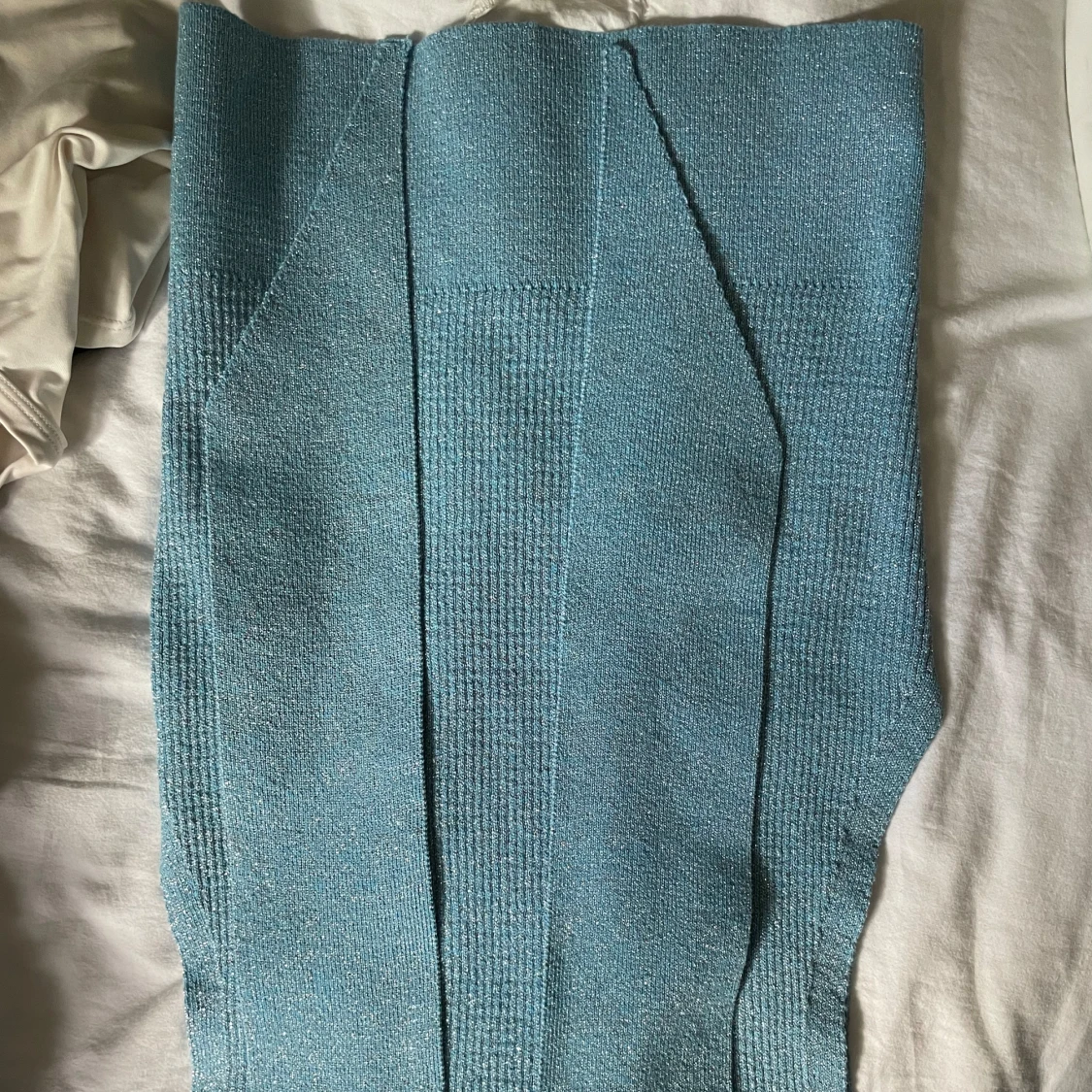 Glittrig polotopp - 93