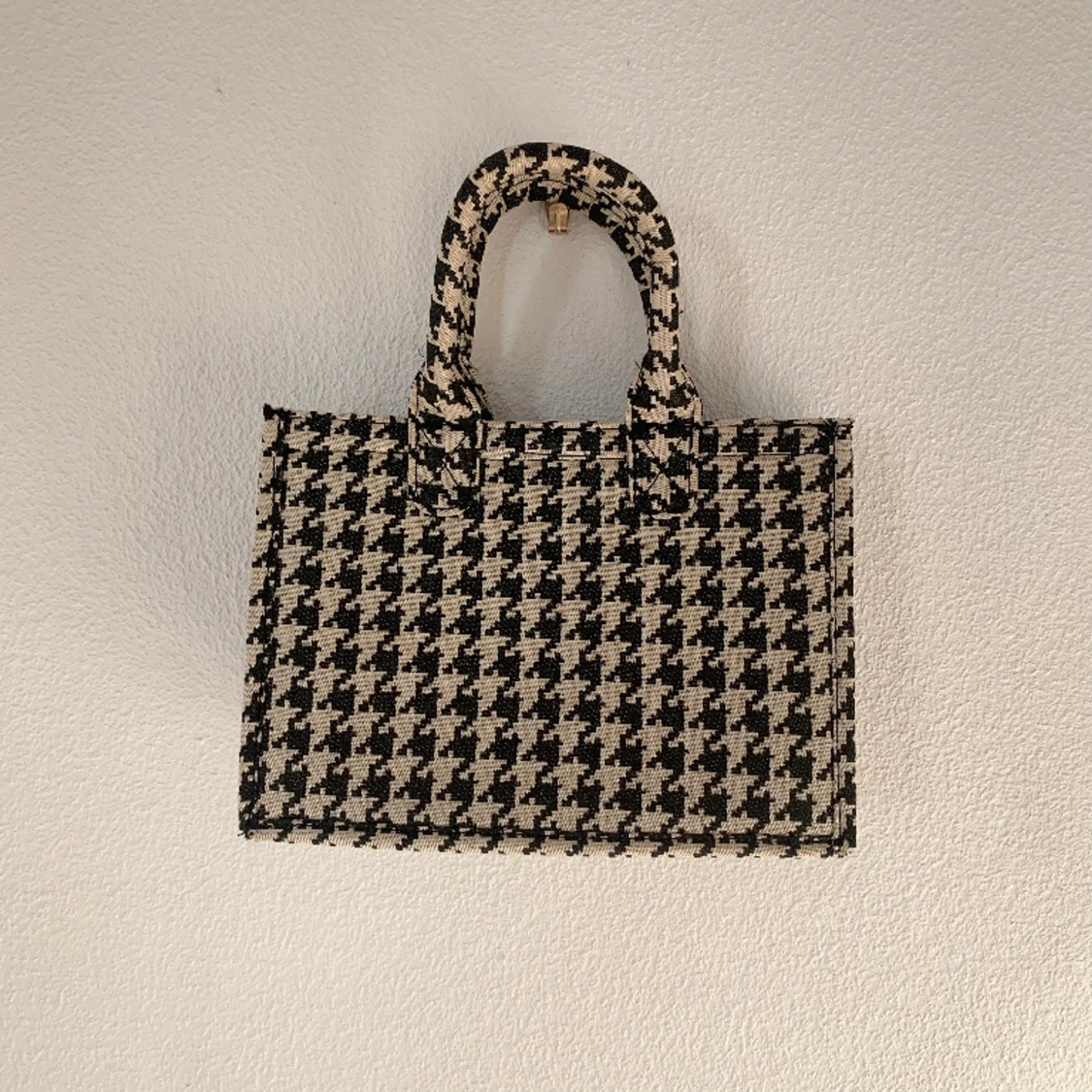 Hudtandsrutig väska - 90