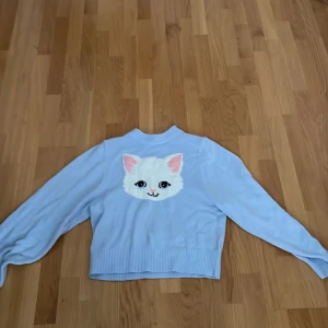 Tröja - Stretch  Ljus Blå Gillar katter  Passar alla