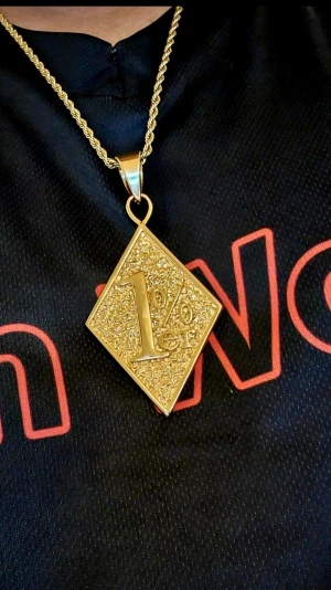 Gold Stainless Steel 1% er One Percent Outlaw Motorcycle Biker necklace - High quality. Chain is ok. But little thin, u can always get a bigger like i have on mine private